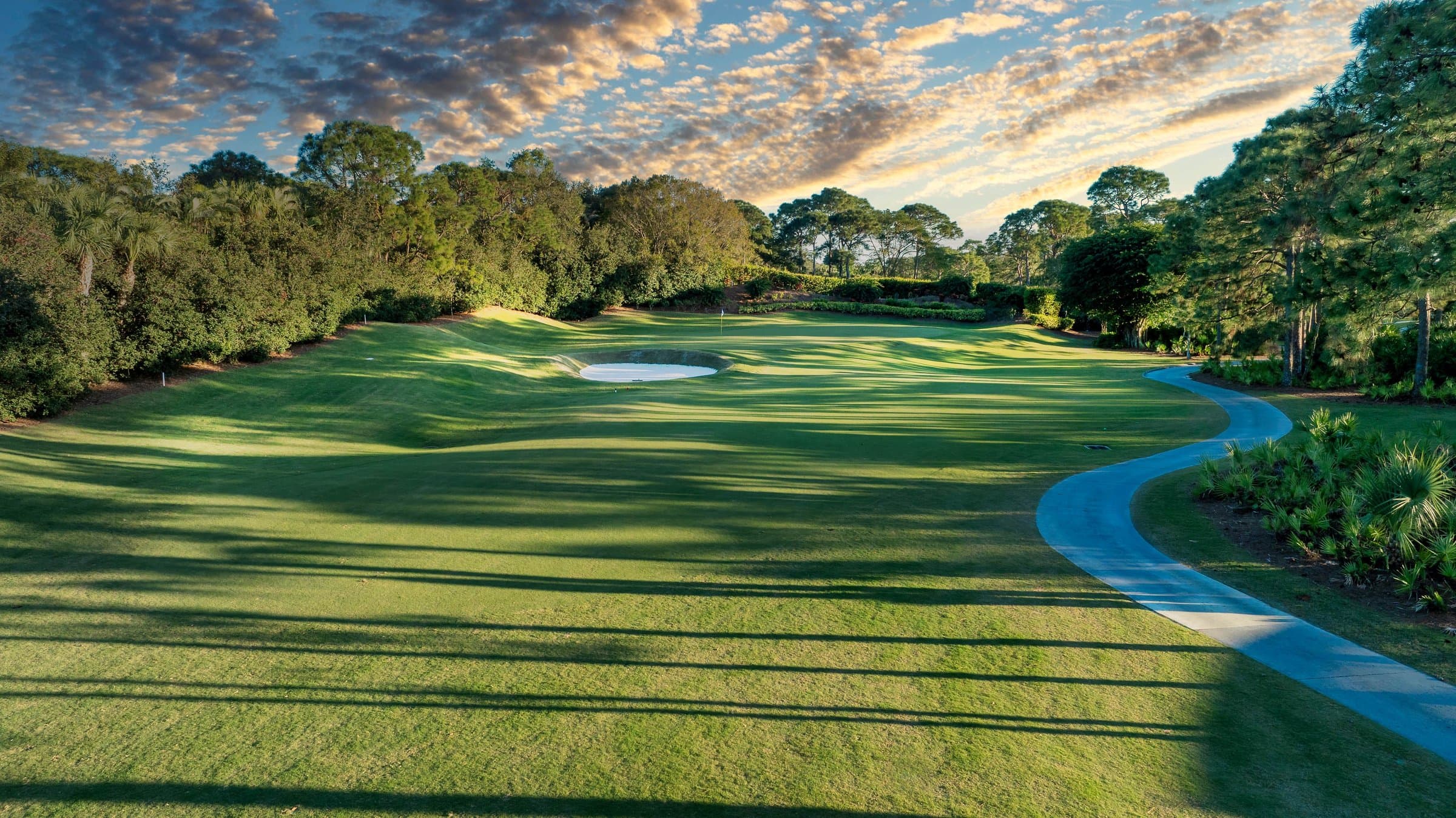 Tree-lined fairway at Willoughby Golf Club in Stuart, Florida